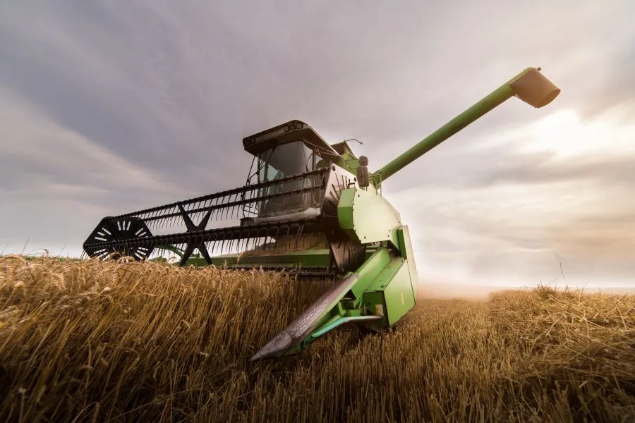 tractor harvesting wheat